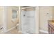 Bathroom featuring a glass-enclosed shower, toilet, and vanity with granite countertops at 1104 Miner St, Idaho Springs, CO 80452