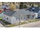 Charming home featuring a well-maintained exterior and a tidy front yard with chain link fence at 1104 Miner St, Idaho Springs, CO 80452