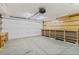 Spacious garage with room for vehicles and ample storage, featuring a wide door at 1104 Miner St, Idaho Springs, CO 80452