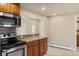Traditional kitchen features granite countertops, a mosaic backsplash and stainless steel appliances at 1104 Miner St, Idaho Springs, CO 80452