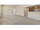 Bright living room view into kitchen features neutral walls and carpet, plus an open floor plan at 1104 Miner St, Idaho Springs, CO 80452