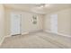 Bright living room with neutral tones, carpet, and natural light, creating a welcoming space at 1104 Miner St, Idaho Springs, CO 80452