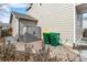 Exterior shot showing trash bins and shed beside the house at 13124 Tejon St, Westminster, CO 80234