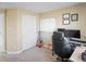 Comfortable home office with large window, desk setup, and whiteboard at 13124 Tejon St, Westminster, CO 80234