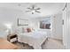 Inviting main bedroom with soft lighting, vaulted ceiling, ceiling fan, and ample closet space at 13124 Tejon St, Westminster, CO 80234