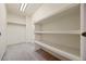 Walk-in closet with built-in shelving and plenty of storage space at 7483 W Cedar Cir, Lakewood, CO 80226