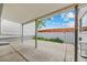 Back patio with ample space for entertaining and enjoying outdoor living at 7483 W Cedar Cir, Lakewood, CO 80226