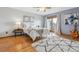 Inviting bedroom with a sliding glass door and natural light at 138 S Holman Way, Golden, CO 80401