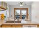 Bright kitchen with a sink overlooking a deck at 138 S Holman Way, Golden, CO 80401