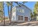 Modern home showcasing clean lines, large windows, and a two-car garage, set on a spacious lot at 11848 Begole Cir, Golden, CO 80403