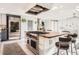 Bright, modern kitchen with large island and modern range, ideal for cooking and dining at 11848 Begole Cir, Golden, CO 80403