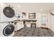 Well-organized laundry room featuring modern appliances, ample storage, and stylish flooring for easy chores at 11848 Begole Cir, Golden, CO 80403