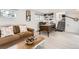Comfortable living room with a vintage desk, brown sofa, and decorative accents at 11848 Begole Cir, Golden, CO 80403