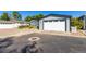 Exterior of home with attached two car garage with long driveway at 6105 Needlegrass # 307, Frederick, CO 80530