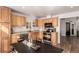 Kitchen features wood cabinets, stainless steel appliances, and granite countertops at 6105 Needlegrass # 307, Frederick, CO 80530