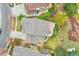 Aerial image of home with spacious backyard, patio, pergola, and well-manicured landscaping at 15767 E 109Th Ave, Commerce City, CO 80022