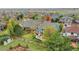 Birds-eye view of the home featuring a large backyard with patio and pergola at 15767 E 109Th Ave, Commerce City, CO 80022