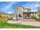 Spacious backyard with a stamped concrete patio, pergola, large windows, and lush green grass at 15767 E 109Th Ave, Commerce City, CO 80022