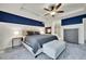 Spacious bedroom suite featuring a tray ceiling, ceiling fan, fireplace, and ensuite bath with soaking tub and shower at 15767 E 109Th Ave, Commerce City, CO 80022