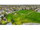 Aerial shot of a Gathering friendly community park featuring a playground at 12432 Bellaire St, Thornton, CO 80241