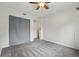 Cozy bedroom with neutral colored carpet and a large closet at 12432 Bellaire St, Thornton, CO 80241