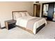 Cozy bedroom with plush carpeting and a comfortable bed with a soft throw blanket at 1551 Larimer St # 1106, Denver, CO 80202