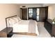 Inviting bedroom featuring closet with mirrored doors, neutral colors and a spacious layout at 1551 Larimer St # 1106, Denver, CO 80202