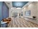 A well-lit common area with lounge seating, a large TV, and stylish decor at 1551 Larimer St # 1106, Denver, CO 80202