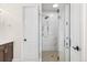 Modern bathroom with a glass-enclosed shower featuring marble tiles and rainfall showerhead at 2330 N Emerson St, Denver, CO 80205