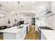 Open concept kitchen with quartz countertops and stainless steel appliances at 2330 N Emerson St, Denver, CO 80205