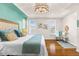 Bedroom with a ceiling fan, hardwood floors, and large windows offering lots of natural light at 2330 N Emerson St, Denver, CO 80205