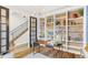 Stylish office with built-in shelving, hardwood floors, and natural light at 2330 N Emerson St, Denver, CO 80205