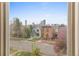 Charming historic home with a skyline view from a window at 2330 N Emerson St, Denver, CO 80205
