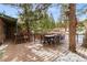 Spacious back deck provides an outdoor dining area and stairs down to the yard at 838 Lakeshore Dr, Boulder, CO 80302