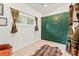 Stylish bedroom featuring custom green cabinets, neutral carpet and curtains, and natural light at 838 Lakeshore Dr, Boulder, CO 80302