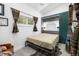 Bedroom with hideaway Murphy bed and custom green cabinets at 838 Lakeshore Dr, Boulder, CO 80302