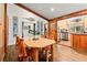 Eat in dining area with natural wood features and easy access to kitchen and stainless steel appliances at 838 Lakeshore Dr, Boulder, CO 80302