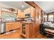 Open-concept kitchen featuring wood counters, cabinetry and stainless steel appliances at 838 Lakeshore Dr, Boulder, CO 80302