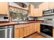 Charming kitchen with wood countertops and stainless steel appliances at 838 Lakeshore Dr, Boulder, CO 80302