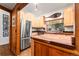 Beautiful kitchen featuring stainless steel appliances, wood countertops and cabinets at 838 Lakeshore Dr, Boulder, CO 80302