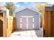 Detached storage shed with double doors at 5711 Yarrow St, Arvada, CO 80002