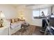 This bedroom features a large window and space for a treadmill at 7255 E Quincy Ave # 404, Denver, CO 80237