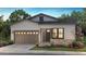 Charming single-story home featuring a stone accent, a two-car garage, and professionally landscaped front yard at 11126 Amber Light Cir, Littleton, CO 80125