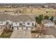 Aerial view of townhomes, showcasing its prime location near parks, green spaces, and recreational areas at 10149 W 55Th Dr # 101, Arvada, CO 80002