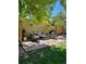 Charming patio setup features an outdoor kitchen, dining table, and comfortable seating at 1950 Kearney St, Denver, CO 80220