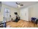 Versatile bedroom currently used as exercise room with hardwood floors at 1950 Kearney St, Denver, CO 80220