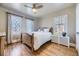 Inviting bedroom with hardwood floors and plenty of natural light at 1950 Kearney St, Denver, CO 80220
