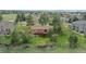 Scenic aerial view of a home with a well-maintained yard and a cozy outdoor patio space at 8746 Sunridge Hollow Rd, Parker, CO 80134
