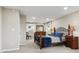 Charming bedroom featuring a wrought iron bed frame and matching wood furnishings at 8746 Sunridge Hollow Rd, Parker, CO 80134