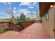 Spacious deck with scenic views surrounded by lush greenery and trees, ideal for relaxing or entertaining guests at 8746 Sunridge Hollow Rd, Parker, CO 80134